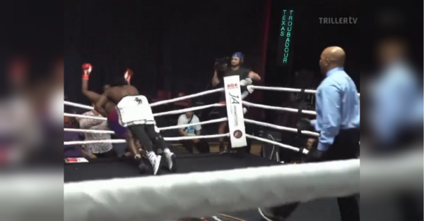 Викинув суперника за ринг і полетів сам: боксерський поєдинок суперважковаговиків завершився божевільною розв'язкою (відео)