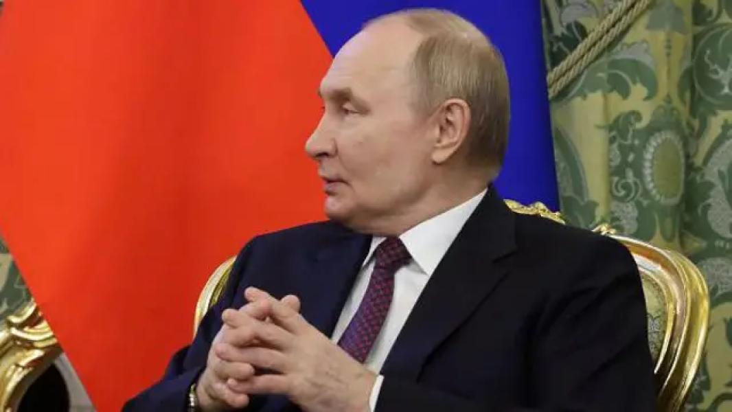 Путін