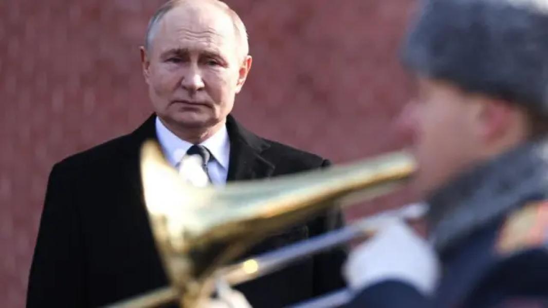 Путін