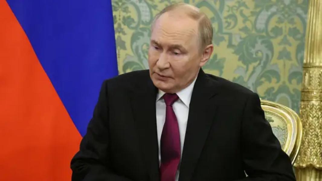 Путін