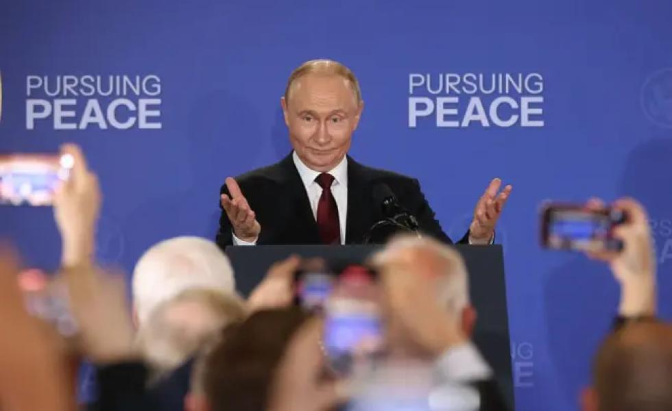 Путін